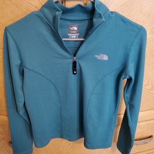 North face half zip top. Greenish blue like new condition. Size xs